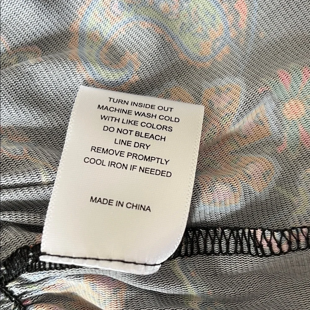 Chelsea & Violet Black Floral Smocked Peplum Blouse